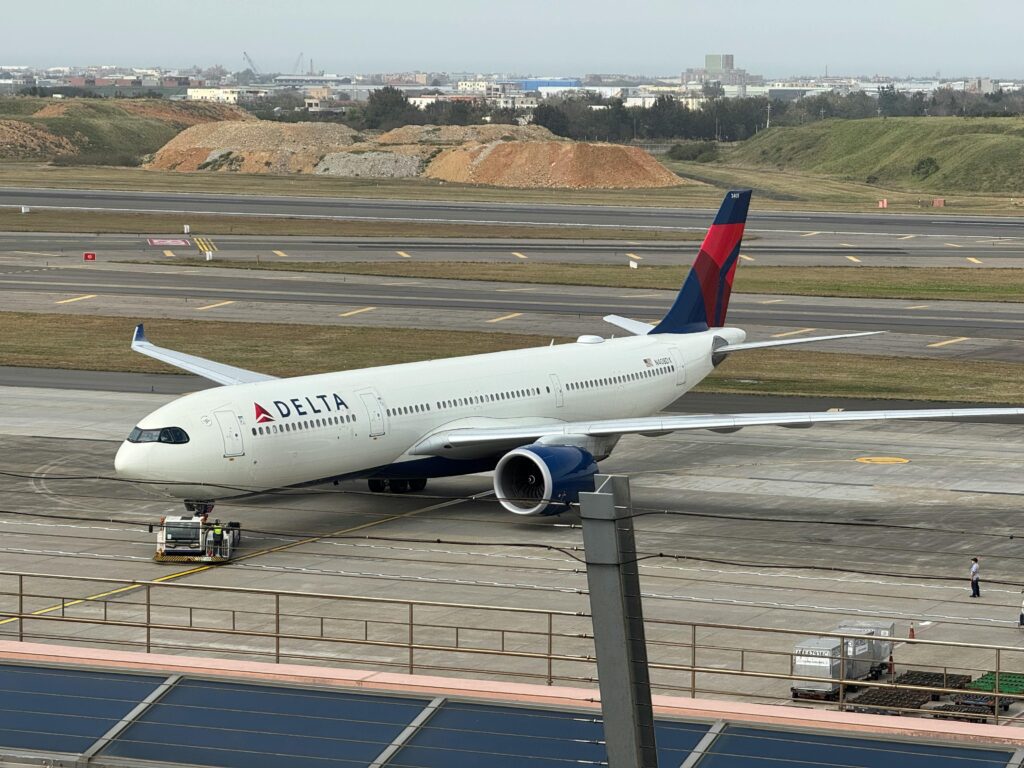 pexels-photo-31387225-31387225 Delta Air Lines Airbus A350 preparing for takeoff at Taiwan Taoyuan International Airport.